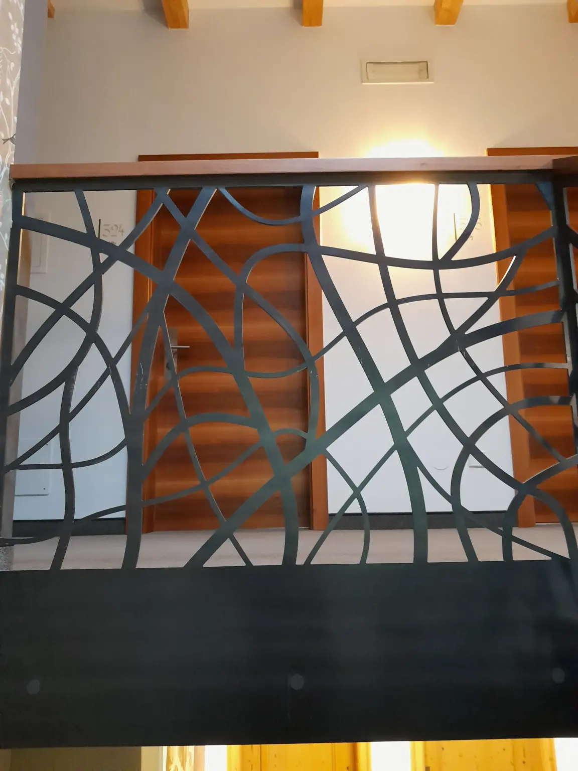 Schlosserei Martin Hoebel Metall Gelaender mit Verzierungen Innen